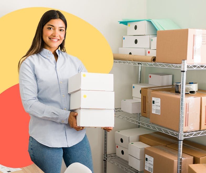 a female small business owner is packing packages 