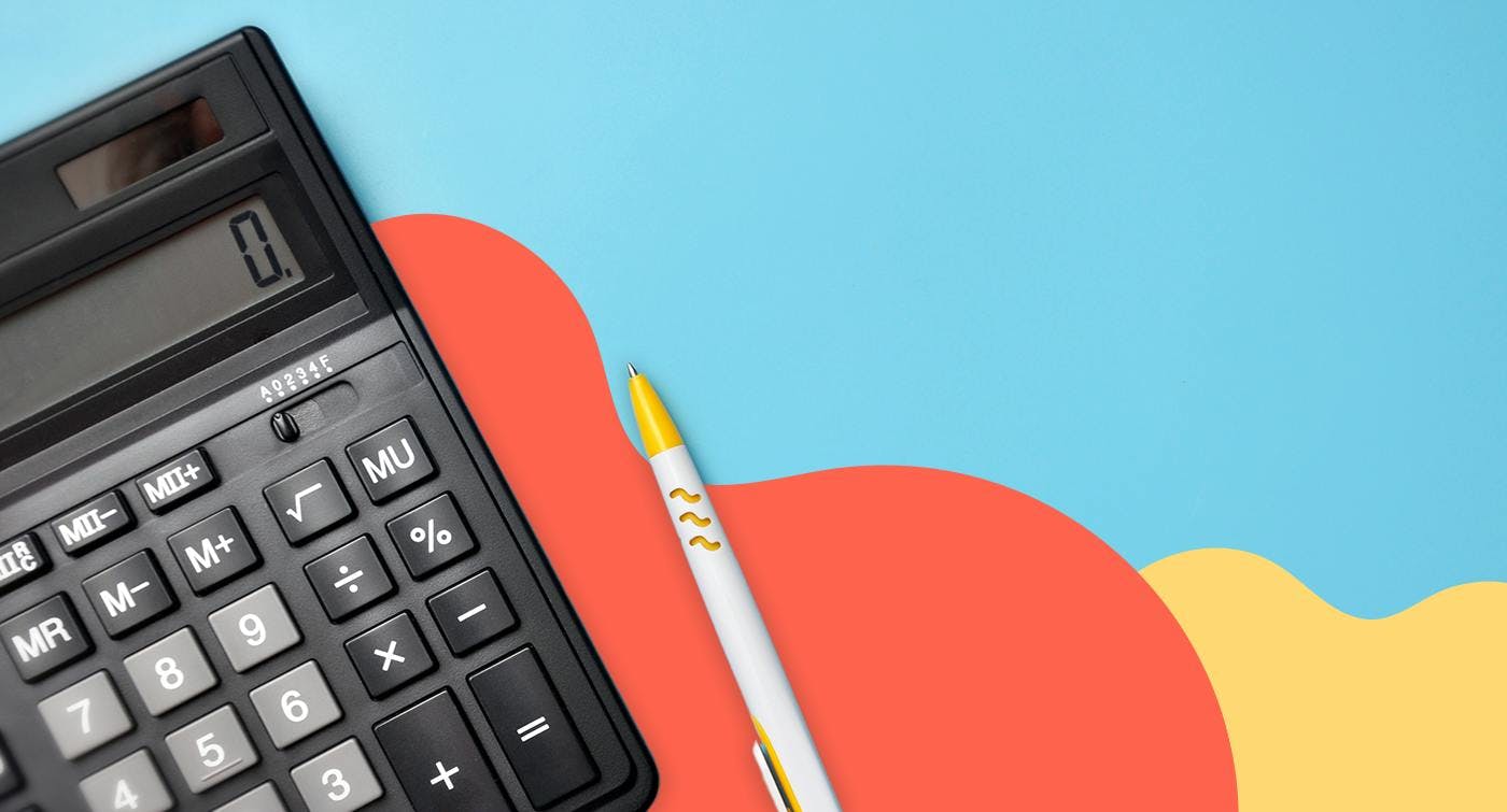 a black calculator and a pen