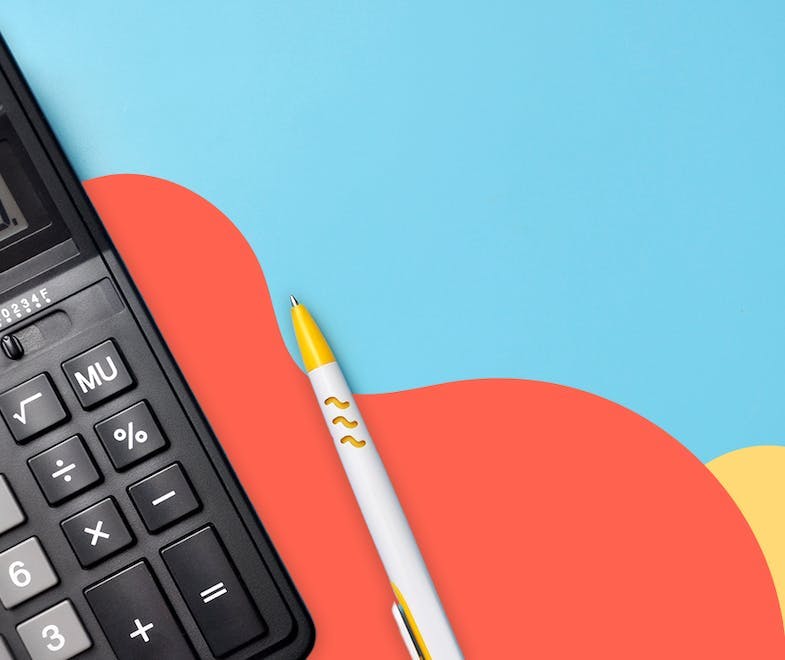 a black calculator and a pen